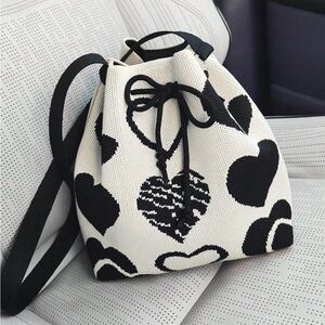 A Crossbody Shoulder Bag. Knitted Texture, Fabric 100% Polyester.